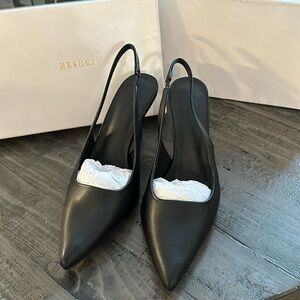 Meshki Black sling back heels